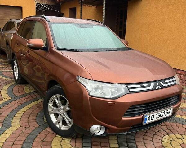 Коричневый Мицубиси Аутлендер, объемом двигателя 2.3 л и пробегом 317 тыс. км за 13000 $, фото 1 на Automoto.ua