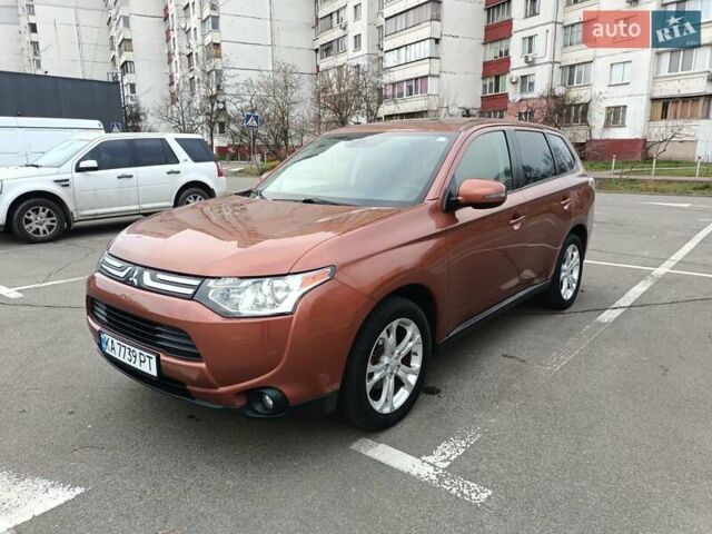 Коричневый Мицубиси Аутлендер, объемом двигателя 2.4 л и пробегом 154 тыс. км за 13700 $, фото 1 на Automoto.ua