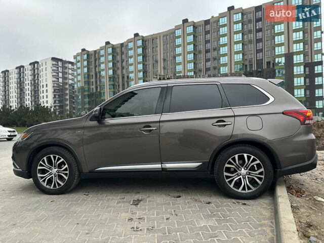 Коричневый Мицубиси Аутлендер, объемом двигателя 3 л и пробегом 164 тыс. км за 14800 $, фото 1 на Automoto.ua