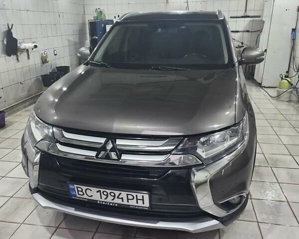 Коричневий Міцубісі Аутлендер, об'ємом двигуна 2.36 л та пробігом 176 тис. км за 15800 $, фото 1 на Automoto.ua