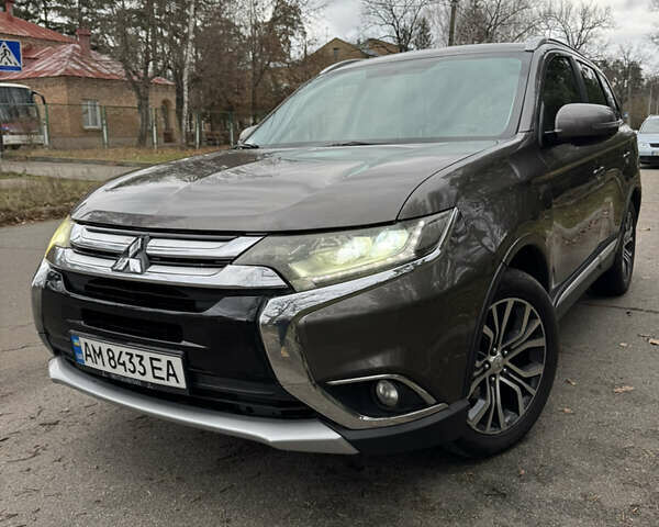 Коричневий Міцубісі Аутлендер, об'ємом двигуна 2.36 л та пробігом 167 тис. км за 12500 $, фото 1 на Automoto.ua