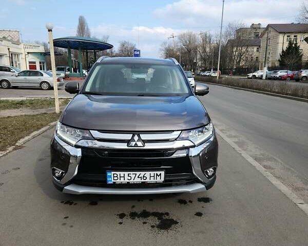 Коричневый Мицубиси Аутлендер, объемом двигателя 2.36 л и пробегом 84 тыс. км за 17500 $, фото 1 на Automoto.ua