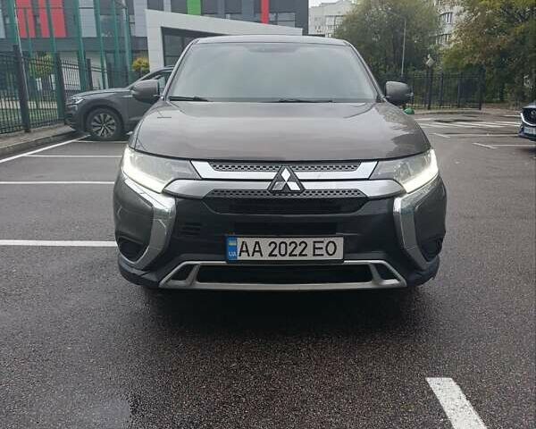 Коричневый Мицубиси Аутлендер, объемом двигателя 2 л и пробегом 117 тыс. км за 18900 $, фото 1 на Automoto.ua