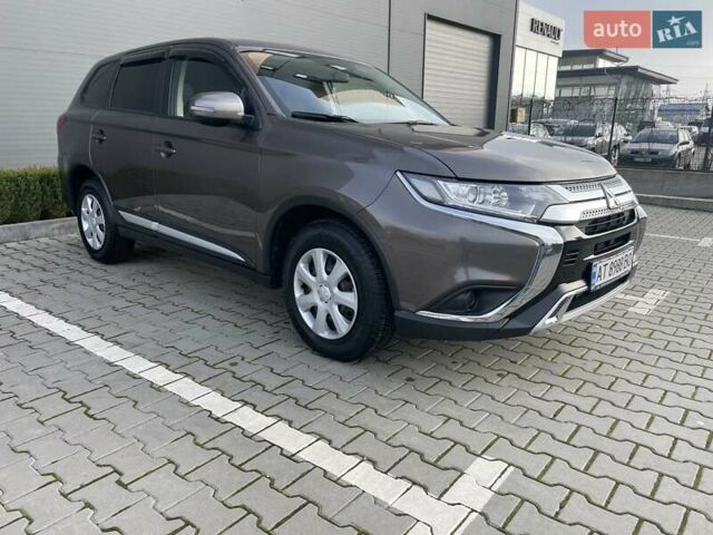 Коричневый Мицубиси Аутлендер, объемом двигателя 2 л и пробегом 65 тыс. км за 19500 $, фото 1 на Automoto.ua