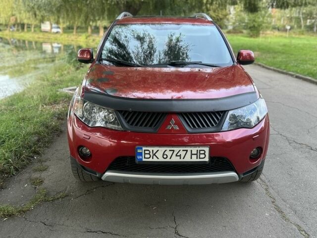Червоний Міцубісі Аутлендер, об'ємом двигуна 3 л та пробігом 310 тис. км за 10200 $, фото 1 на Automoto.ua