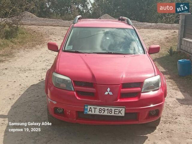Червоний Міцубісі Аутлендер, об'ємом двигуна 2.38 л та пробігом 299 тис. км за 4200 $, фото 1 на Automoto.ua