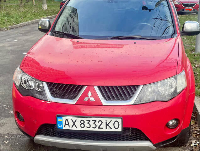 Красный Мицубиси Аутлендер, объемом двигателя 2.36 л и пробегом 306 тыс. км за 9300 $, фото 1 на Automoto.ua