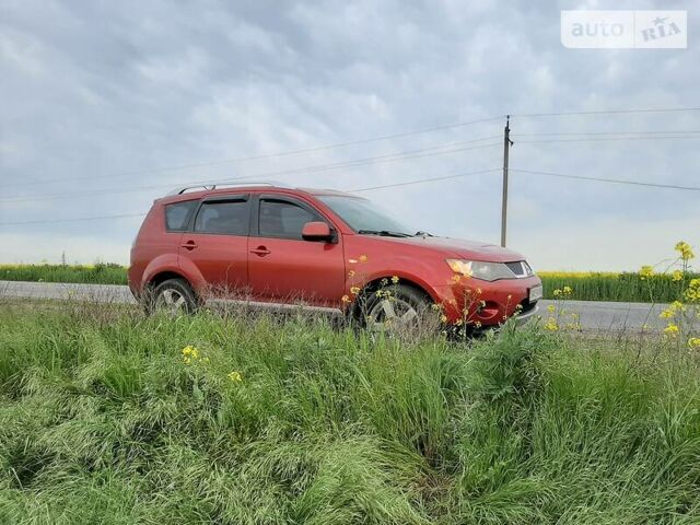 Червоний Міцубісі Аутлендер, об'ємом двигуна 2.4 л та пробігом 184 тис. км за 9000 $, фото 1 на Automoto.ua