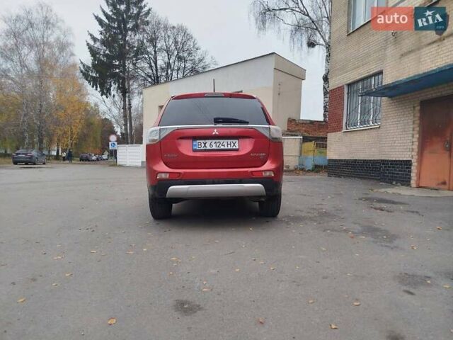 Красный Мицубиси Аутлендер, объемом двигателя 3 л и пробегом 230 тыс. км за 14200 $, фото 1 на Automoto.ua