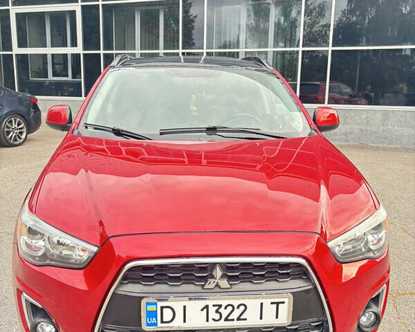 Красный Мицубиси Аутлендер, объемом двигателя 2 л и пробегом 210 тыс. км за 13500 $, фото 1 на Automoto.ua