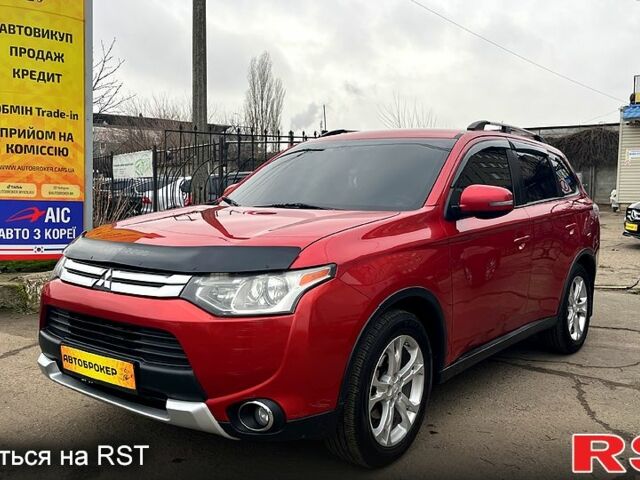 Красный Мицубиси Аутлендер, объемом двигателя 2.4 л и пробегом 209 тыс. км за 13500 $, фото 1 на Automoto.ua