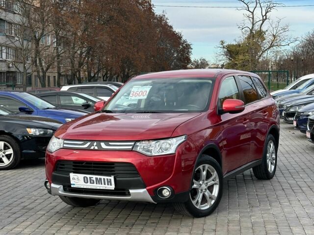 Красный Мицубиси Аутлендер, объемом двигателя 2.4 л и пробегом 213 тыс. км за 11900 $, фото 1 на Automoto.ua