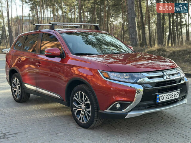Червоний Міцубісі Аутлендер, об'ємом двигуна 2.4 л та пробігом 160 тис. км за 13200 $, фото 1 на Automoto.ua