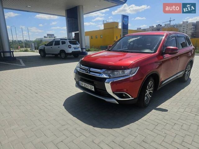 Червоний Міцубісі Аутлендер, об'ємом двигуна 2.4 л та пробігом 182 тис. км за 14900 $, фото 1 на Automoto.ua