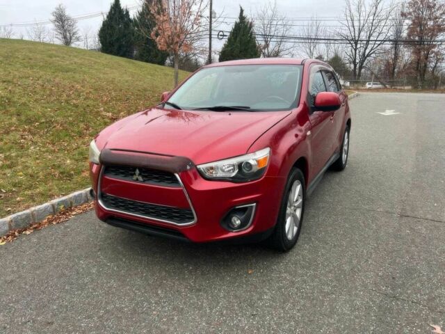 Червоний Міцубісі Аутлендер, об'ємом двигуна 2 л та пробігом 75 тис. км за 9000 $, фото 1 на Automoto.ua