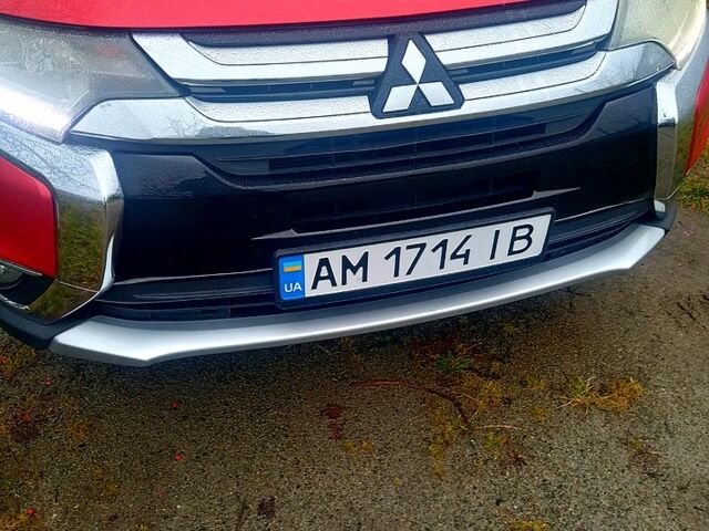 Червоний Міцубісі Аутлендер, об'ємом двигуна 2.4 л та пробігом 131 тис. км за 16300 $, фото 1 на Automoto.ua