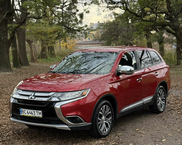 Червоний Міцубісі Аутлендер, об'ємом двигуна 2.36 л та пробігом 190 тис. км за 12000 $, фото 1 на Automoto.ua