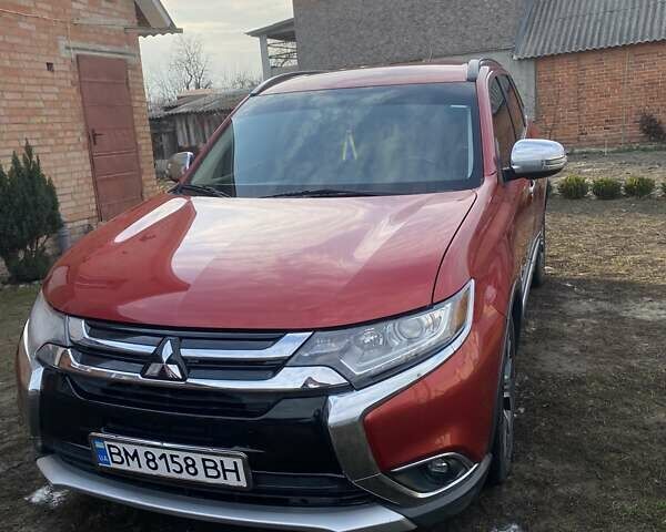 Червоний Міцубісі Аутлендер, об'ємом двигуна 2.4 л та пробігом 188 тис. км за 16000 $, фото 1 на Automoto.ua