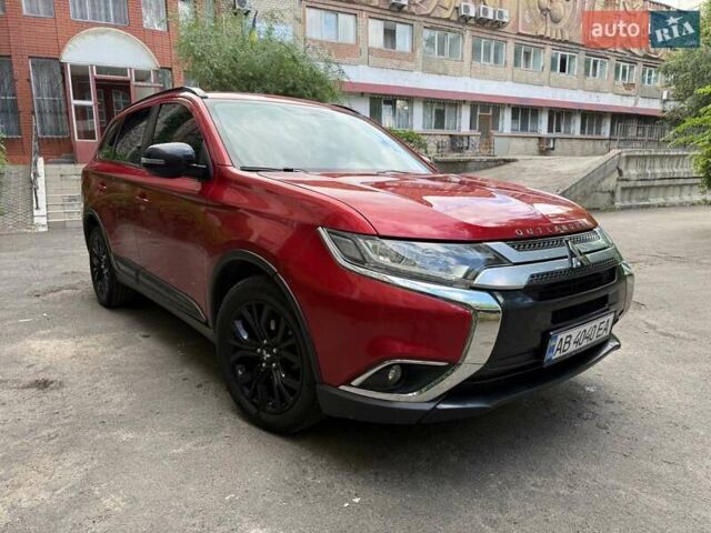 Червоний Міцубісі Аутлендер, об'ємом двигуна 2.4 л та пробігом 120 тис. км за 16000 $, фото 1 на Automoto.ua