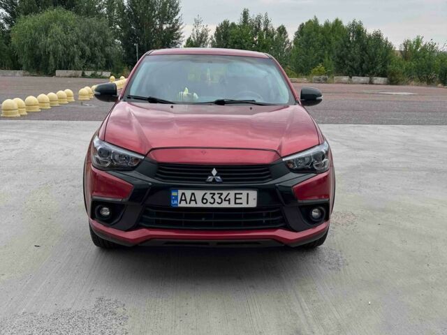 Красный Мицубиси Аутлендер, объемом двигателя 2 л и пробегом 124 тыс. км за 12300 $, фото 1 на Automoto.ua