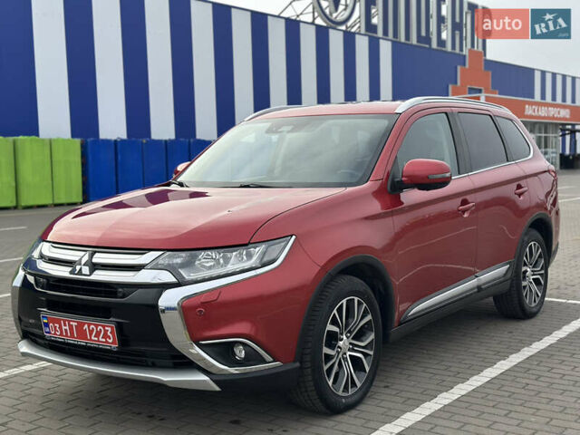 Красный Мицубиси Аутлендер, объемом двигателя 2.2 л и пробегом 118 тыс. км за 20999 $, фото 1 на Automoto.ua