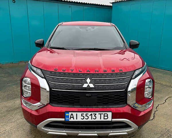 Красный Мицубиси Аутлендер, объемом двигателя 2.49 л и пробегом 44 тыс. км за 25000 $, фото 1 на Automoto.ua