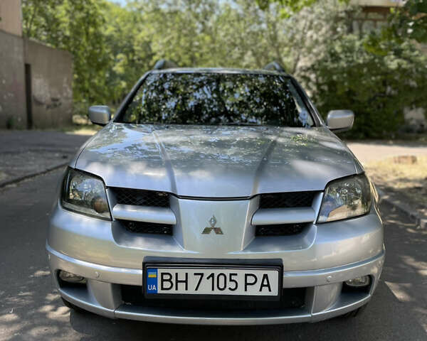 Мицубиси Аутлендер, объемом двигателя 2.4 л и пробегом 285 тыс. км за 5800 $, фото 1 на Automoto.ua
