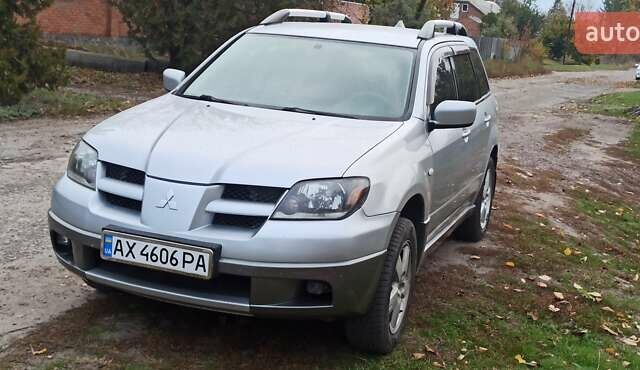 Мицубиси Аутлендер, объемом двигателя 2 л и пробегом 234 тыс. км за 5700 $, фото 1 на Automoto.ua