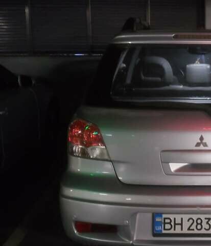 Мицубиси Аутлендер, объемом двигателя 2.4 л и пробегом 350 тыс. км за 4600 $, фото 1 на Automoto.ua