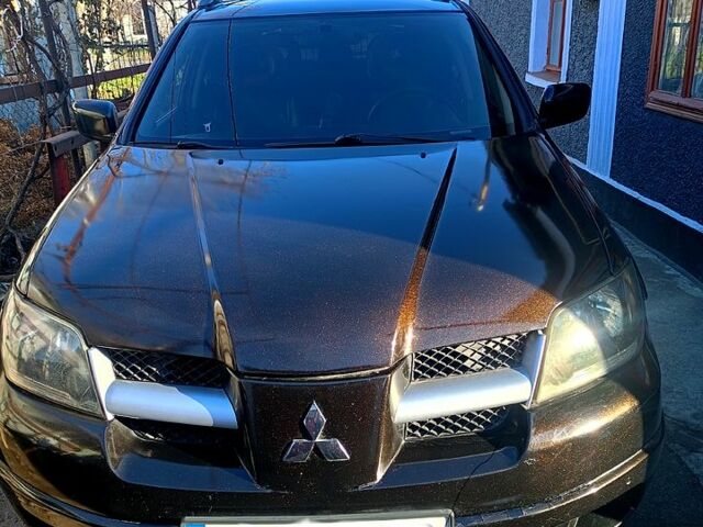 Мицубиси Аутлендер, объемом двигателя 2.4 л и пробегом 0 тыс. км за 7200 $, фото 1 на Automoto.ua