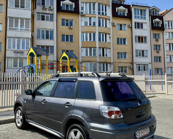 Мицубиси Аутлендер, объемом двигателя 2 л и пробегом 212 тыс. км за 6900 $, фото 1 на Automoto.ua
