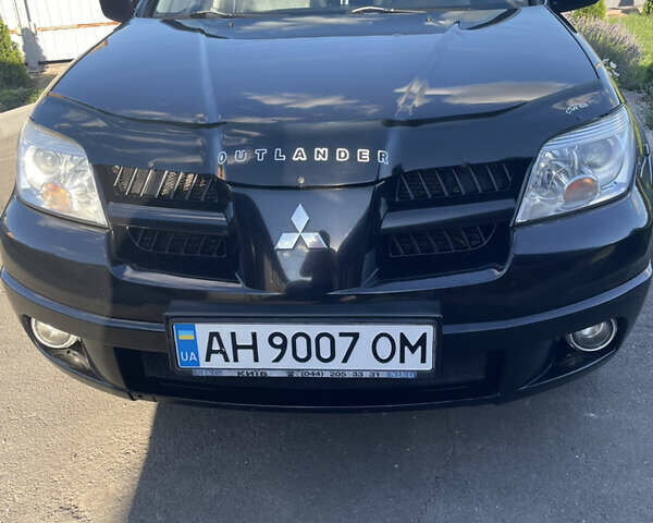 Міцубісі Аутлендер, об'ємом двигуна 2.38 л та пробігом 253 тис. км за 8300 $, фото 1 на Automoto.ua