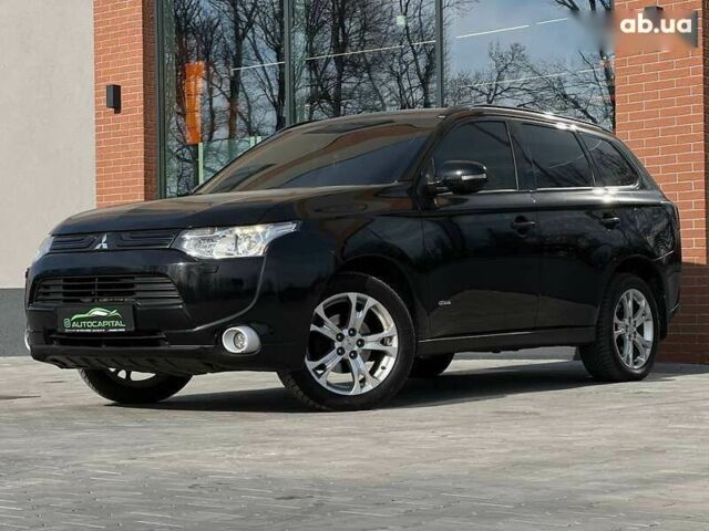 Мицубиси Аутлендер, объемом двигателя 2.4 л и пробегом 212 тыс. км за 11490 $, фото 1 на Automoto.ua