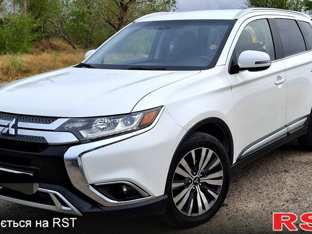 Мицубиси Аутлендер, объемом двигателя 2.4 л и пробегом 82 тыс. км за 19600 $, фото 1 на Automoto.ua