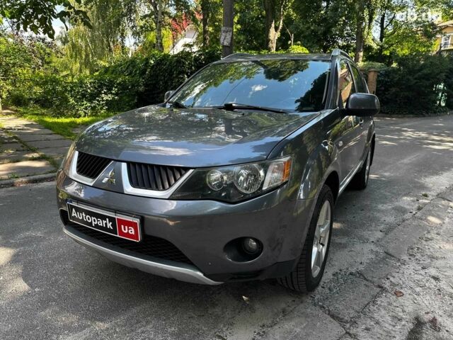 Серый Мицубиси Аутлендер, объемом двигателя 2.4 л и пробегом 130 тыс. км за 9790 $, фото 1 на Automoto.ua