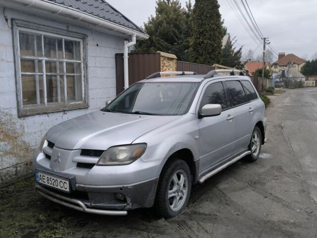 Сірий Міцубісі Аутлендер, об'ємом двигуна 2.4 л та пробігом 320 тис. км за 4900 $, фото 1 на Automoto.ua