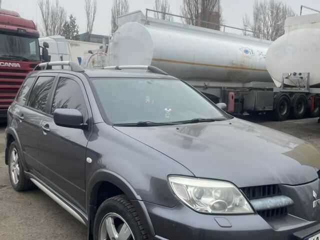 Сірий Міцубісі Аутлендер, об'ємом двигуна 2.4 л та пробігом 190 тис. км за 6500 $, фото 1 на Automoto.ua