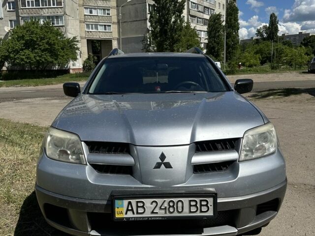 Сірий Міцубісі Аутлендер, об'ємом двигуна 2 л та пробігом 298 тис. км за 7000 $, фото 1 на Automoto.ua