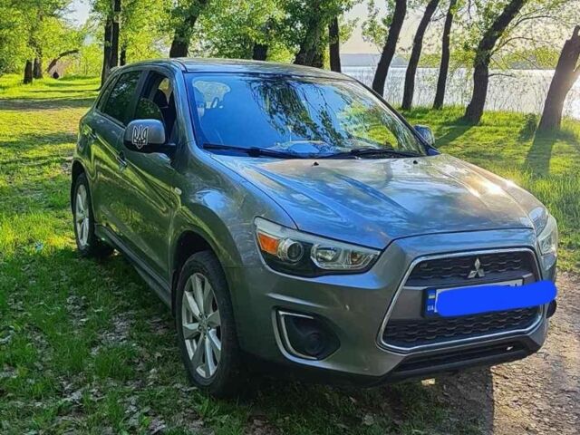 Серый Мицубиси Аутлендер, объемом двигателя 2 л и пробегом 130 тыс. км за 10958 $, фото 1 на Automoto.ua