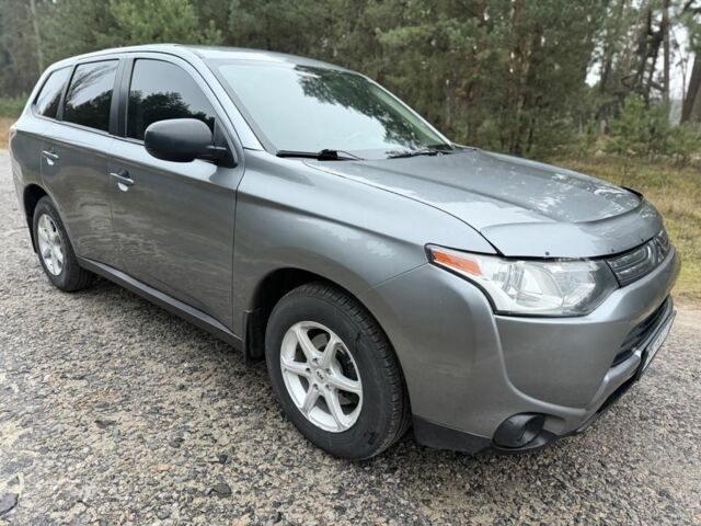 Серый Мицубиси Аутлендер, объемом двигателя 2.4 л и пробегом 150 тыс. км за 10900 $, фото 1 на Automoto.ua