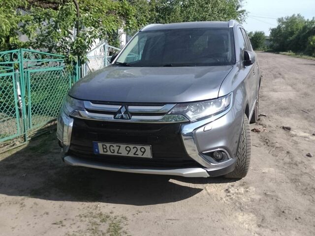 Сірий Міцубісі Аутлендер, об'ємом двигуна 2.3 л та пробігом 195 тис. км за 11000 $, фото 1 на Automoto.ua