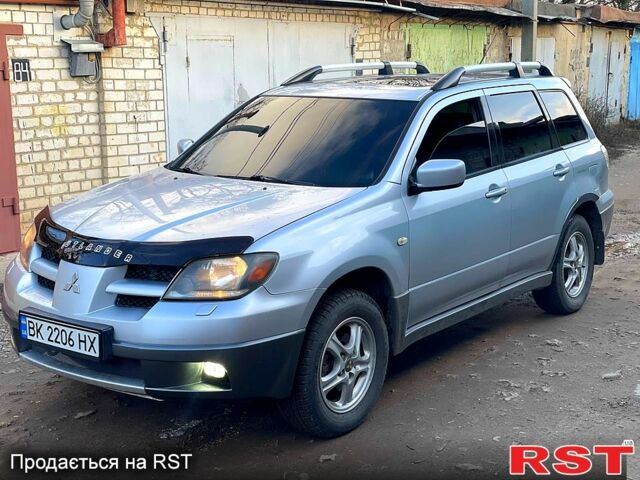 Сірий Міцубісі Аутлендер, об'ємом двигуна 2 л та пробігом 333 тис. км за 4850 $, фото 1 на Automoto.ua
