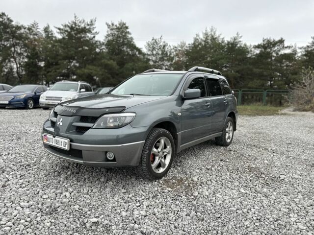 Серый Мицубиси Аутлендер, объемом двигателя 0 л и пробегом 265 тыс. км за 6300 $, фото 1 на Automoto.ua