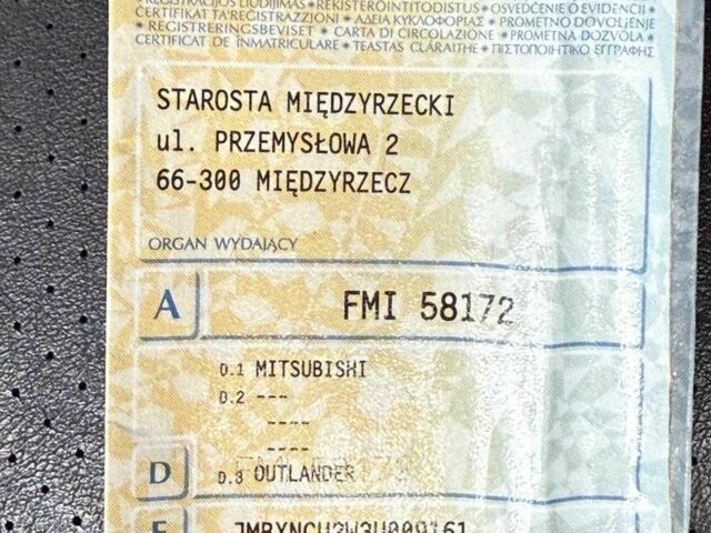 Серый Мицубиси Аутлендер, объемом двигателя 2 л и пробегом 400 тыс. км за 2000 $, фото 1 на Automoto.ua