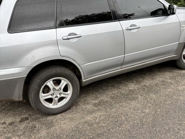 Серый Мицубиси Аутлендер, объемом двигателя 2 л и пробегом 2 тыс. км за 4261 $, фото 1 на Automoto.ua