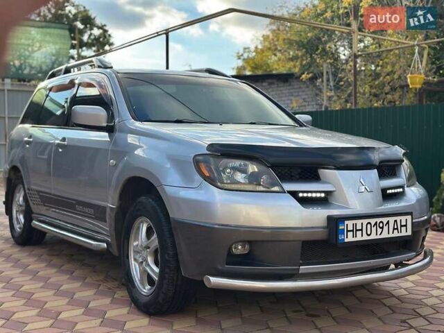 Сірий Міцубісі Аутлендер, об'ємом двигуна 2.4 л та пробігом 161 тис. км за 7500 $, фото 1 на Automoto.ua