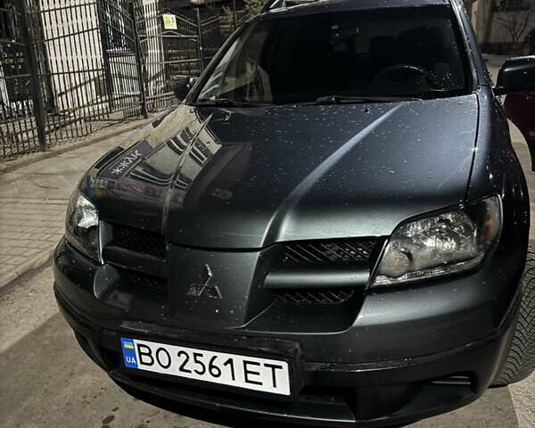 Сірий Міцубісі Аутлендер, об'ємом двигуна 2 л та пробігом 259 тис. км за 5100 $, фото 1 на Automoto.ua