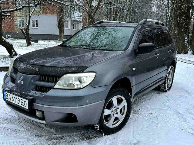 Серый Мицубиси Аутлендер, объемом двигателя 2 л и пробегом 390 тыс. км за 5400 $, фото 1 на Automoto.ua