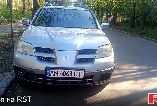 Сірий Міцубісі Аутлендер, об'ємом двигуна 2.4 л та пробігом 280 тис. км за 5400 $, фото 1 на Automoto.ua