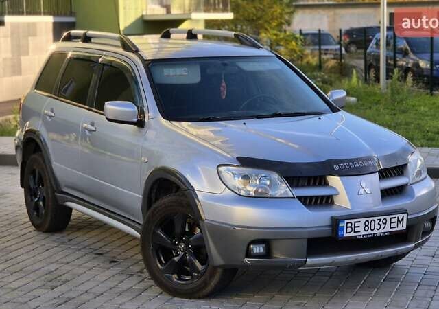 Сірий Міцубісі Аутлендер, об'ємом двигуна 2.4 л та пробігом 259 тис. км за 5999 $, фото 1 на Automoto.ua